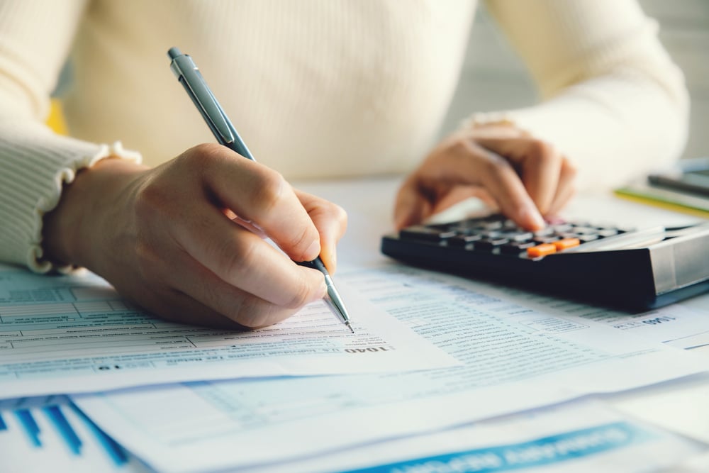 woman filing tax forms